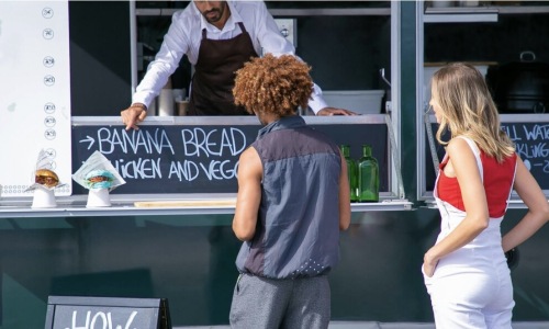 women at food truck